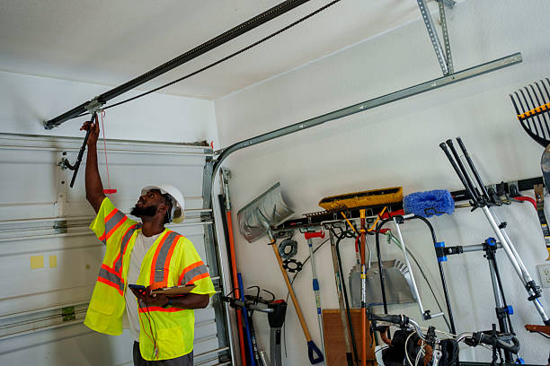 Professional Garage Door Panel Replacement technician working in Bemidji, MN